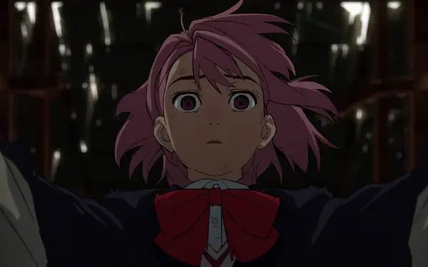 Aira Shiratori from the anime Dandadan gazes with concern, her pink hair flowing in a dark, atmospheric background. This HD wallpaper captures a moment of tension and intrigue.
