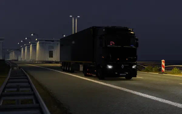 HD PC desktop wallpaper featuring a black Renault truck driving at night in Euro Truck Simulator 2 video game.