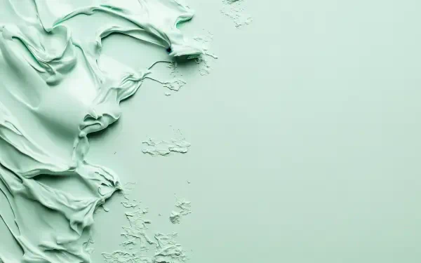 A textured mint green background featuring smooth and rough paint strokes, designed as a 4K Ultra HD PC desktop wallpaper.