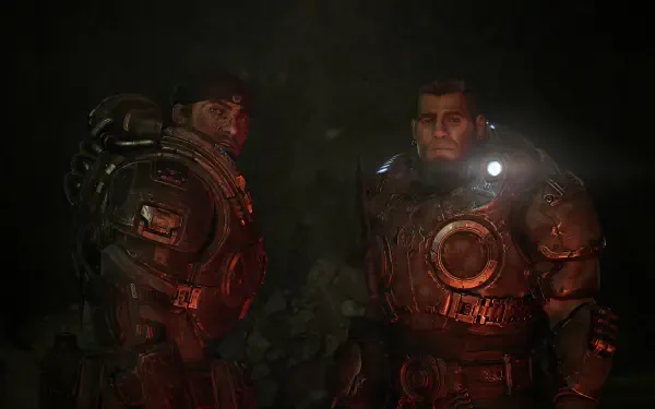 A dark, atmospheric scene from the video game Gears of War: E-Day, featuring two armored characters in a tense moment. This image serves as a stunning 4K Ultra HD PC desktop wallpaper.