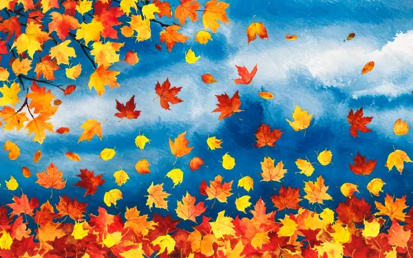 Vibrant autumn leaves cascade against a blue sky in this stunning 4K Ultra HD wallpaper, capturing the essence of fall's beauty. Perfect for a desktop background.