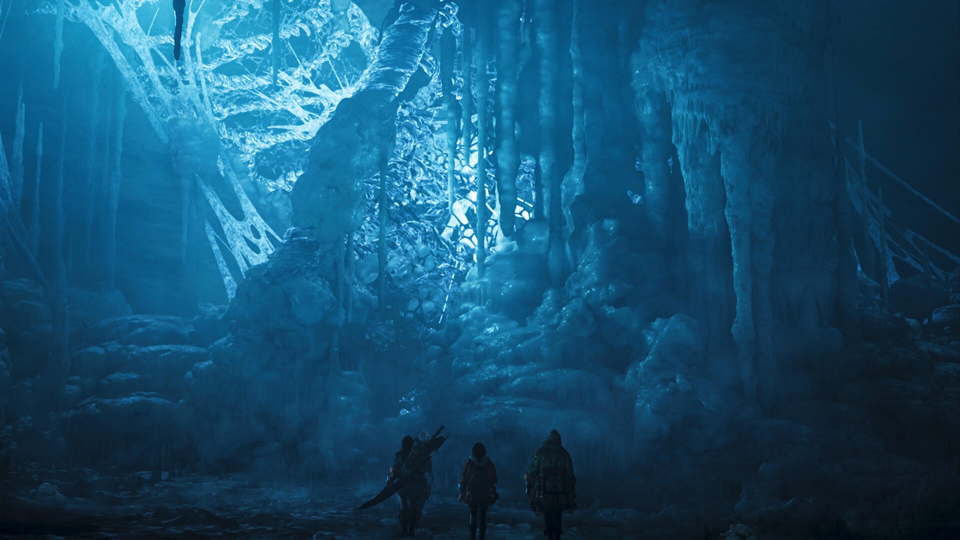 A striking HD wallpaper from Monster Hunter Wilds, featuring three hunters exploring a stunning icy cavern illuminated by blue light.