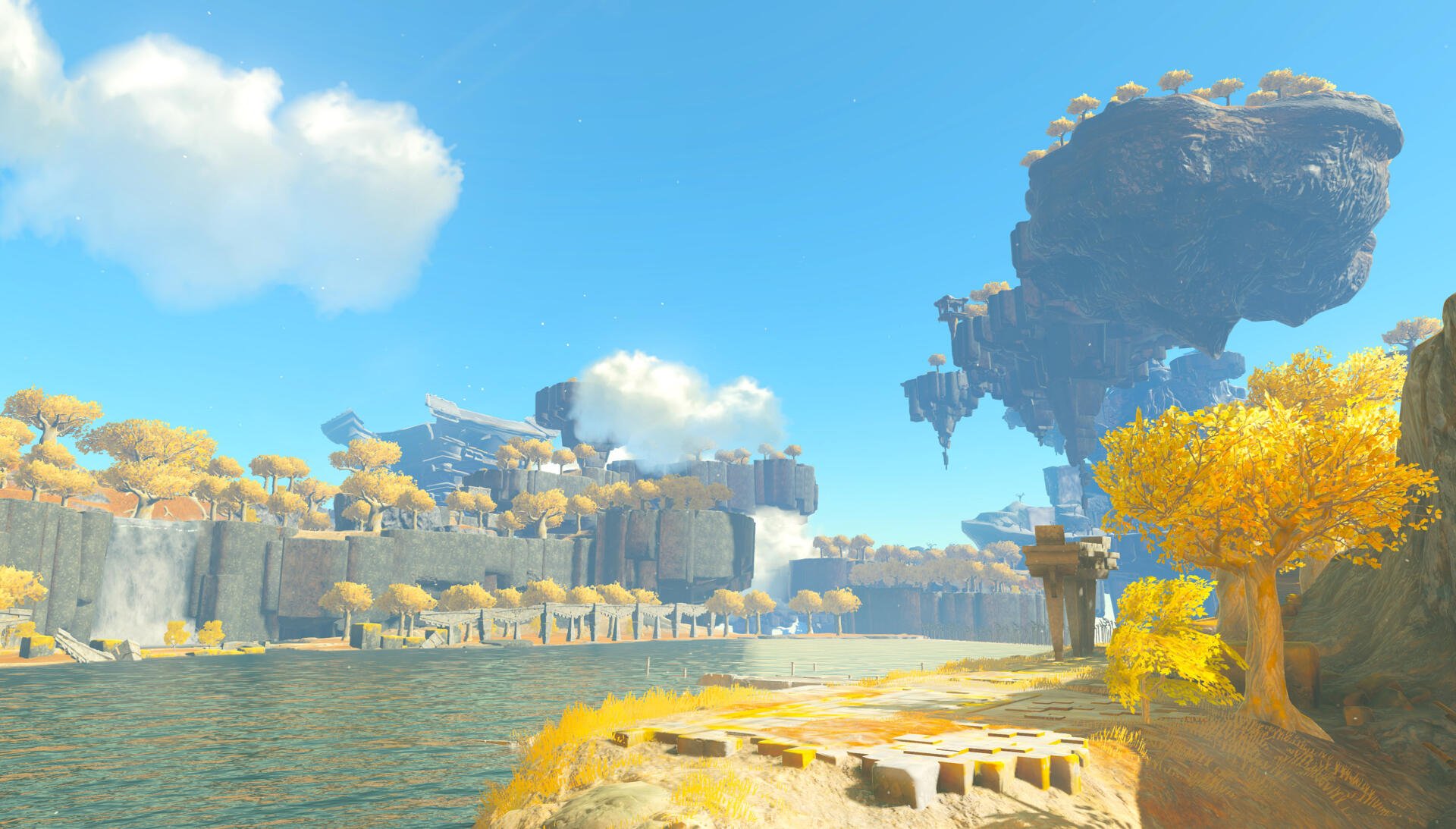 HD PC desktop wallpaper featuring a bright, scenic landscape from The Legend of Zelda: Tears of the Kingdom with floating islands and autumn-hued trees.