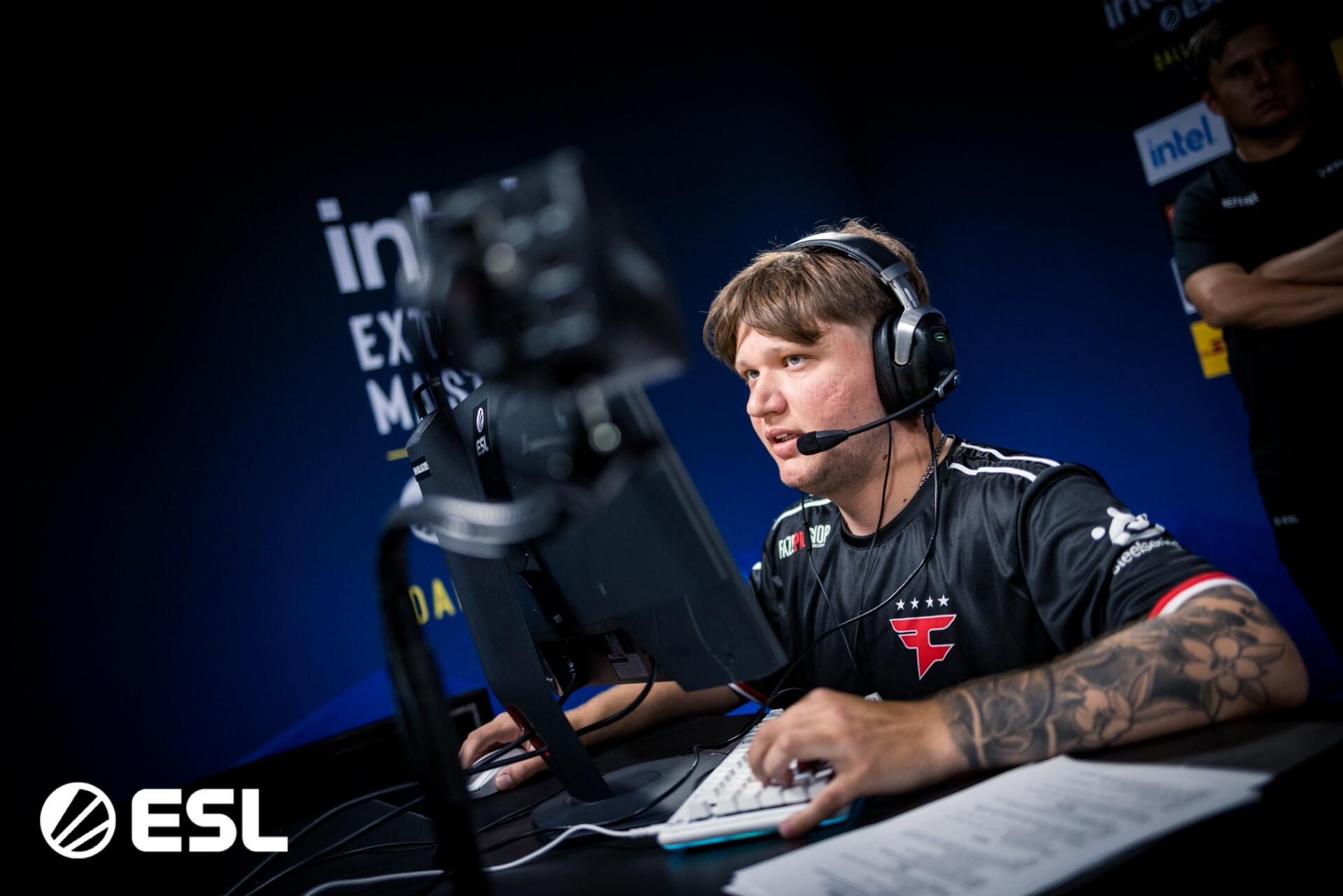 HD esports wallpaper featuring Faze Clan player s1mple intensely focused during a competitive gaming match, with ESL and Intel branding in the background.