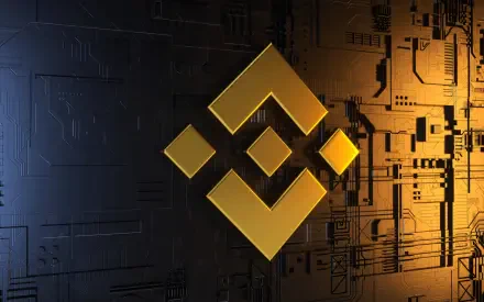 A high-definition desktop wallpaper featuring the golden Binance logo set against a backdrop of intricate technology and cryptocurrency elements.