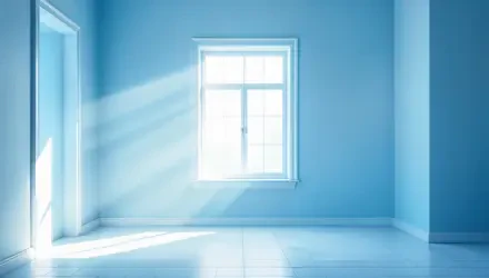 A serene blue-themed room featuring a window that lets in soft, natural light, creating a tranquil atmosphere. This image serves as a 4K Ultra HD PC desktop wallpaper.