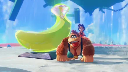 HD PC desktop wallpaper featuring Donkey Kong and a character from Donkey Kong Bananza with a large glowing banana in a vibrant, animated video game setting.