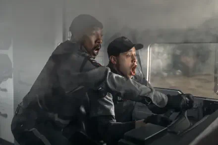 Action-packed scene from the movie The Pickup, featured as a 4K Ultra HD PC desktop wallpaper and background, showing two intense characters in motion.
