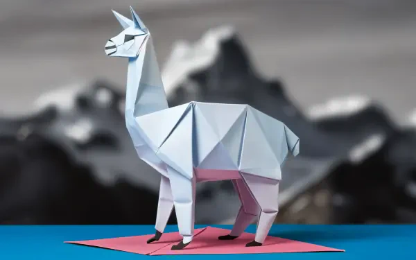 A 4K Ultra HD wallpaper featuring a stylized origami alpaca, set against a blurred mountain backdrop, showcasing intricate folds and vibrant colors.