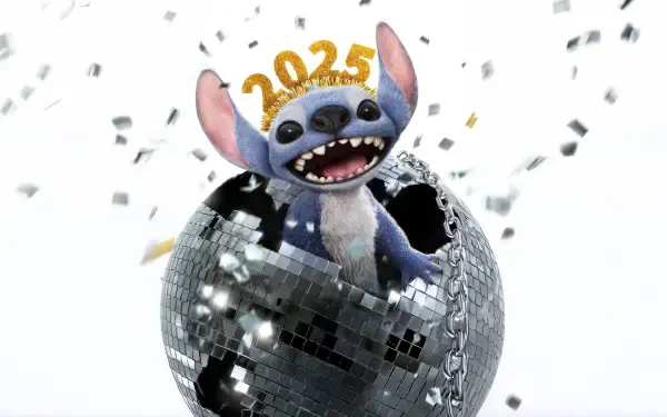 Stitch from Lilo & Stitch celebrates the year 2025 while popping out of a sparkling disco ball, surrounded by confetti in this vibrant 4K Ultra HD wallpaper.