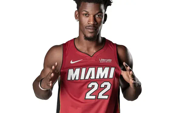 4K Ultra HD image of NBA player Jimmy Butler in a Miami Heat jersey, number 22, against a white background for PC desktop wallpaper.