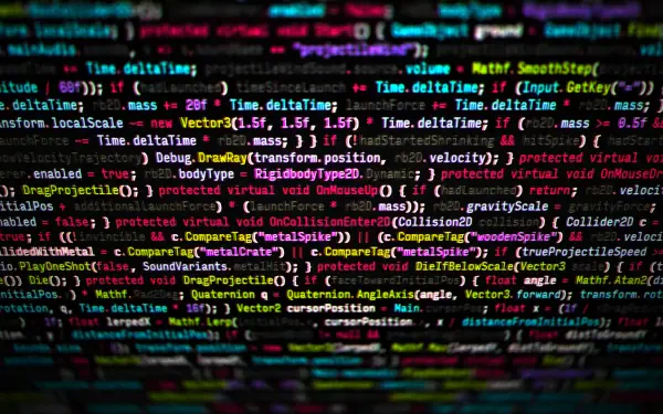 HD PC desktop wallpaper featuring colorful programming code with syntax highlighting on a dark background, showcasing a dynamic and detailed coding environment.