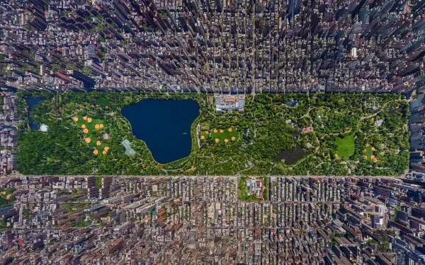 Aerial HD view of Central Park surrounded by the dense cityscape of New York City, captured in sharp detail as a desktop wallpaper background.