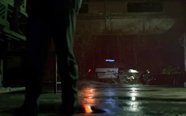 HD PC desktop wallpaper from Resident Evil 7: Biohazard featuring a dimly lit scene with a police car in the background and a figure standing in the foreground.