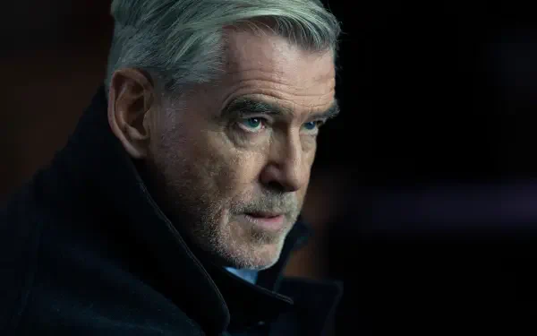 Close-up of Pierce Brosnan from the TV show MobLand, captured in a 4K Ultra HD desktop wallpaper and background.