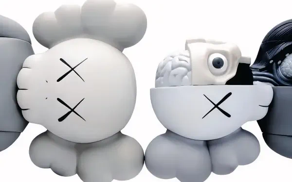 HD PC desktop wallpaper featuring artistic KAWS figures with signature crossed-out eyes and detailed sculptural elements on a white background.