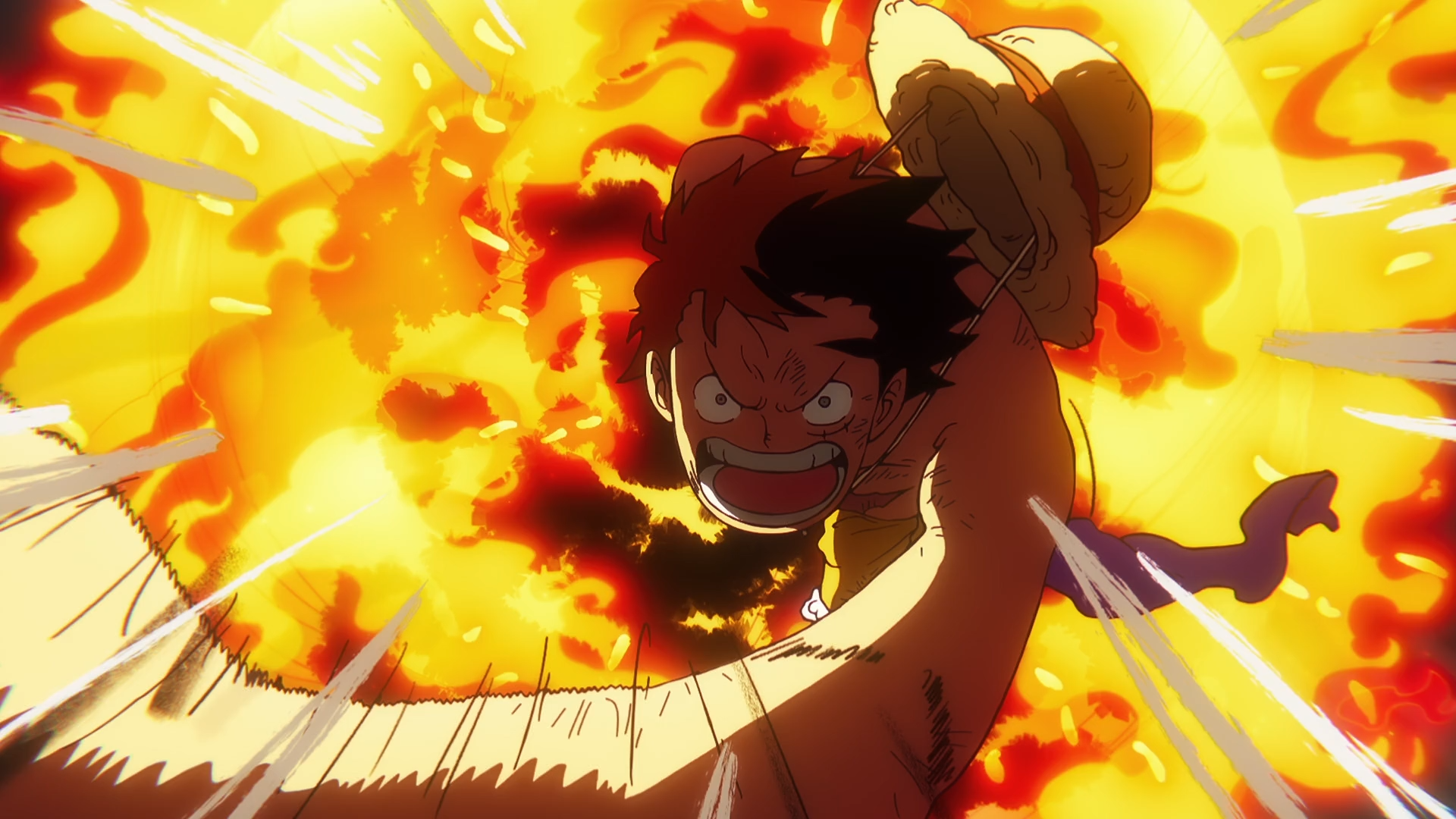 HD One Piece anime wallpaper: Monkey D. Luffy mid-attack, straw hat lifted, stretched arm and fierce grin against a blazing explosion backdrop.