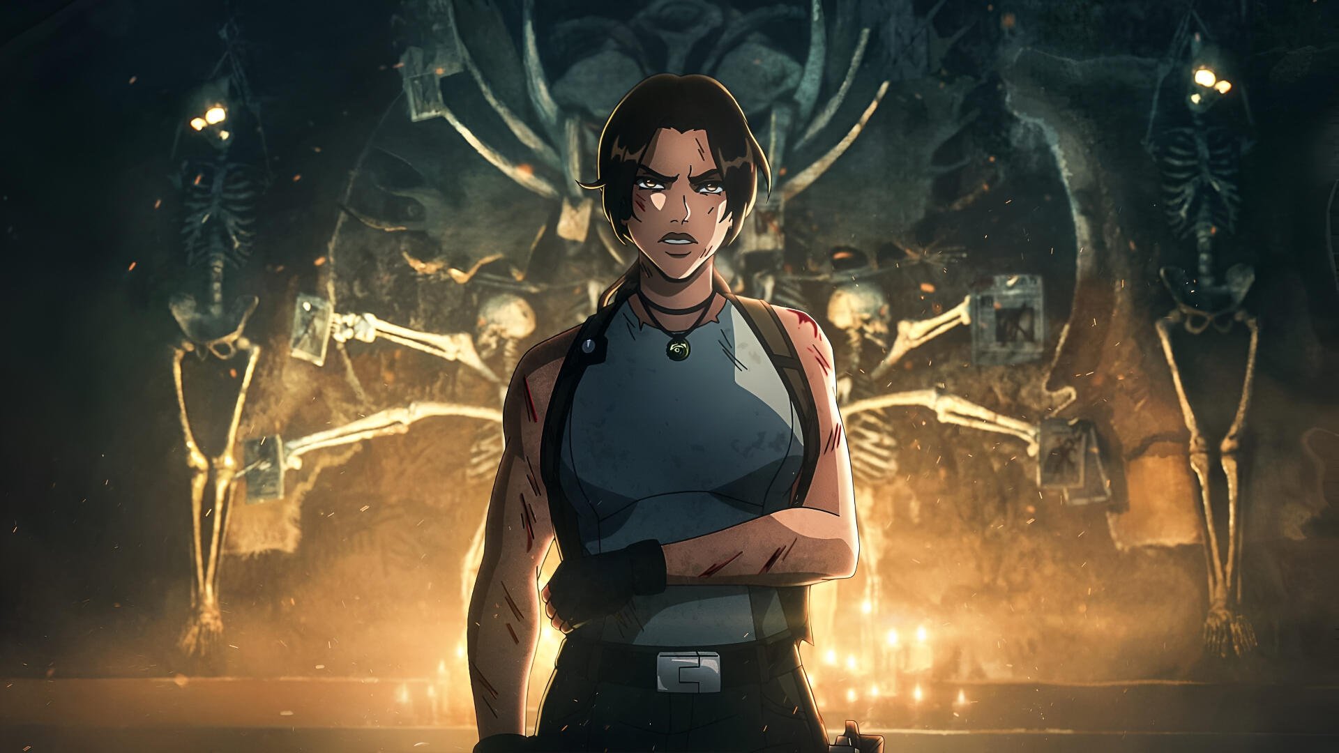 Lara Croft from Tomb Raider: The Legend of Lara Croft stands with arms crossed before a torchlit ancient shrine — 4K Ultra HD PC wallpaper.