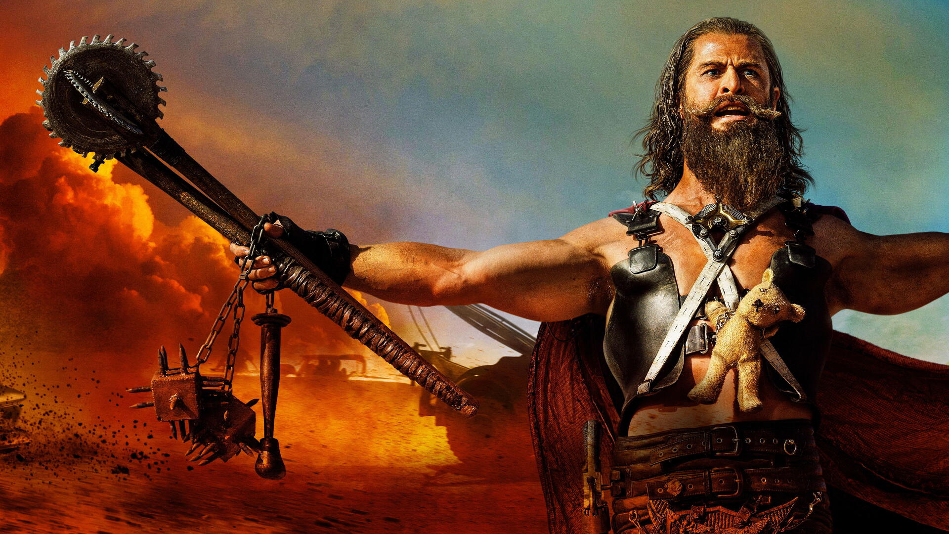Furiosa: A Mad Max Saga 4K Ultra HD PC wallpaper — rugged bearded warrior in leather armor holding a spiked chain weapon against a burning desert sky.