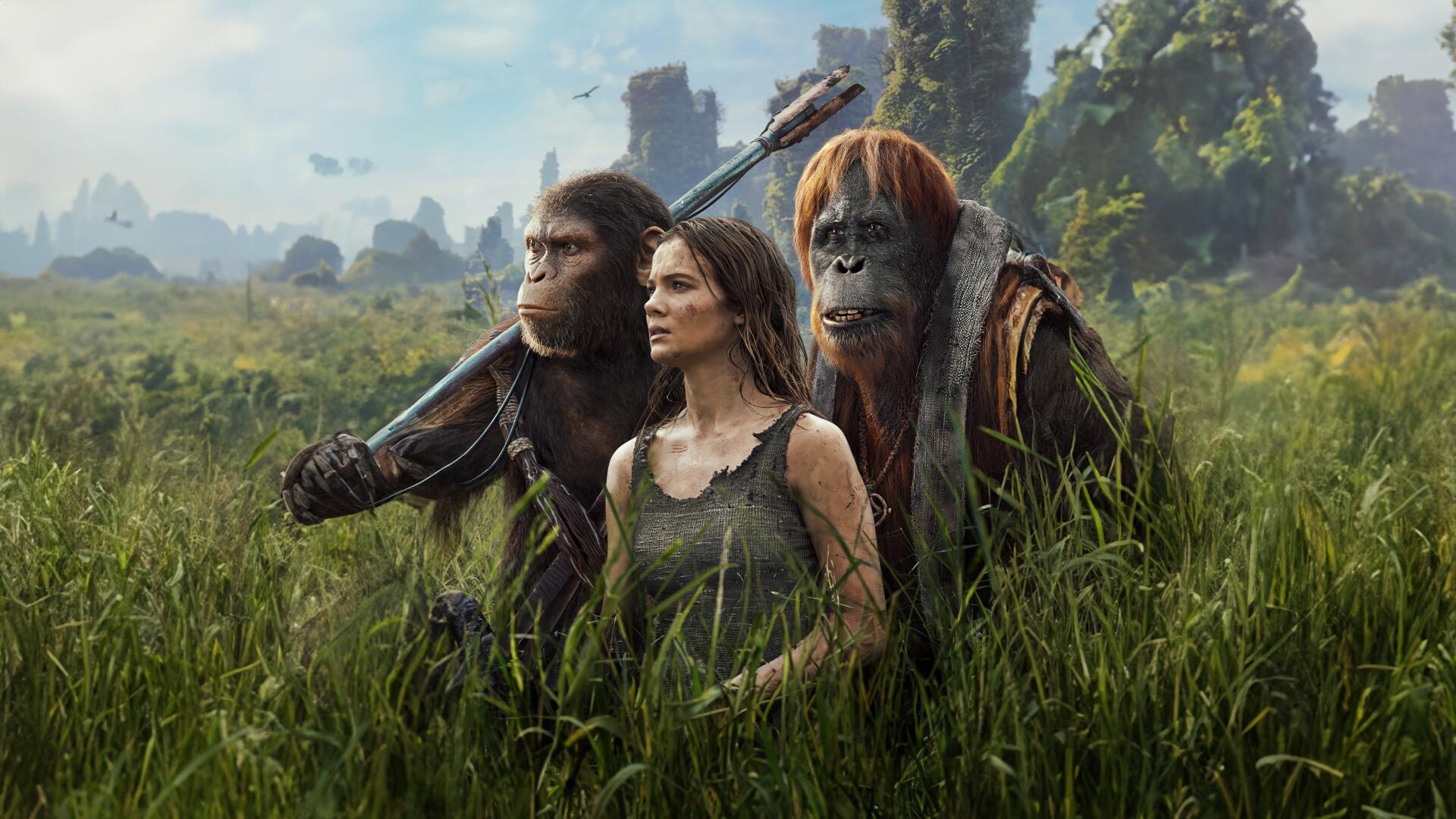 Woman and two apes wading through tall grass with ruined towers on the horizon — Kingdom of the Planet of the Apes 4K Ultra HD PC desktop wallpaper/background
