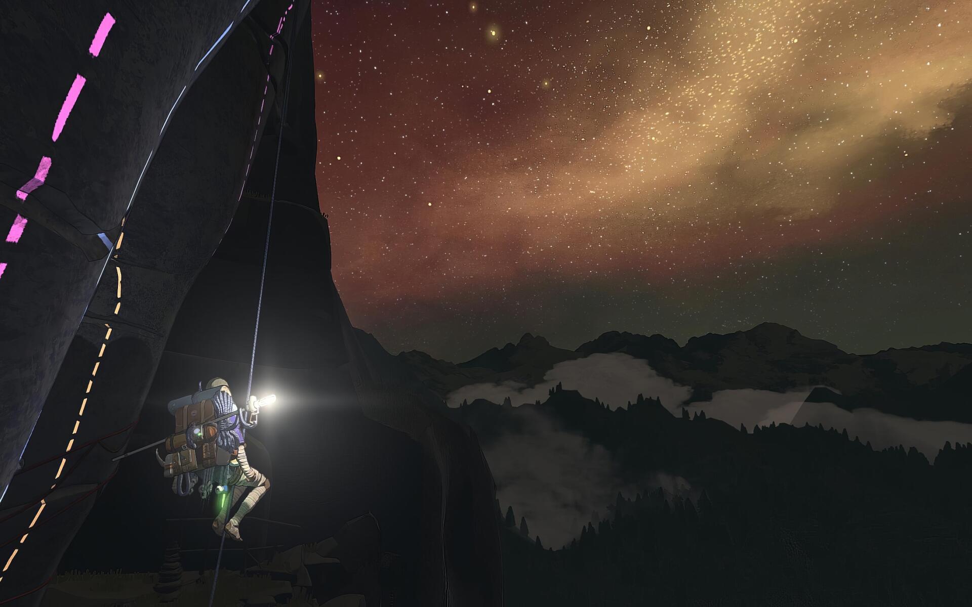 HD PC desktop wallpaper and background — a climber ascending a dark cliff toward a cairn silhouette, headlamp beam across a starry sky and mist-shrouded mountain ridges.