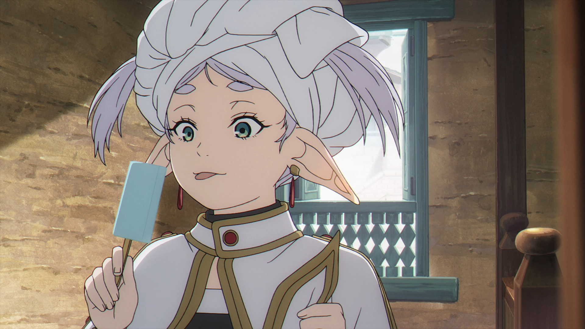 HD PC desktop wallpaper of Frieren (Frieren: Beyond Journey's End) — elf-eared Frieren with towel-wrapped hair eating a popsicle, surprised expression in a sunlit wooden room.