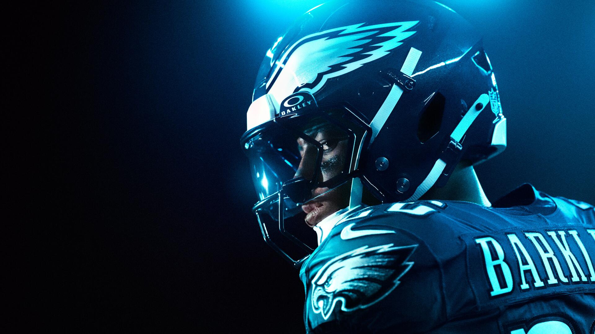 4K Ultra HD PC desktop wallpaper: Madden NFL 26 sports game close-up of an NFL running back in Eagles helmet and jersey, dramatic blue-lit stadium portrait.
