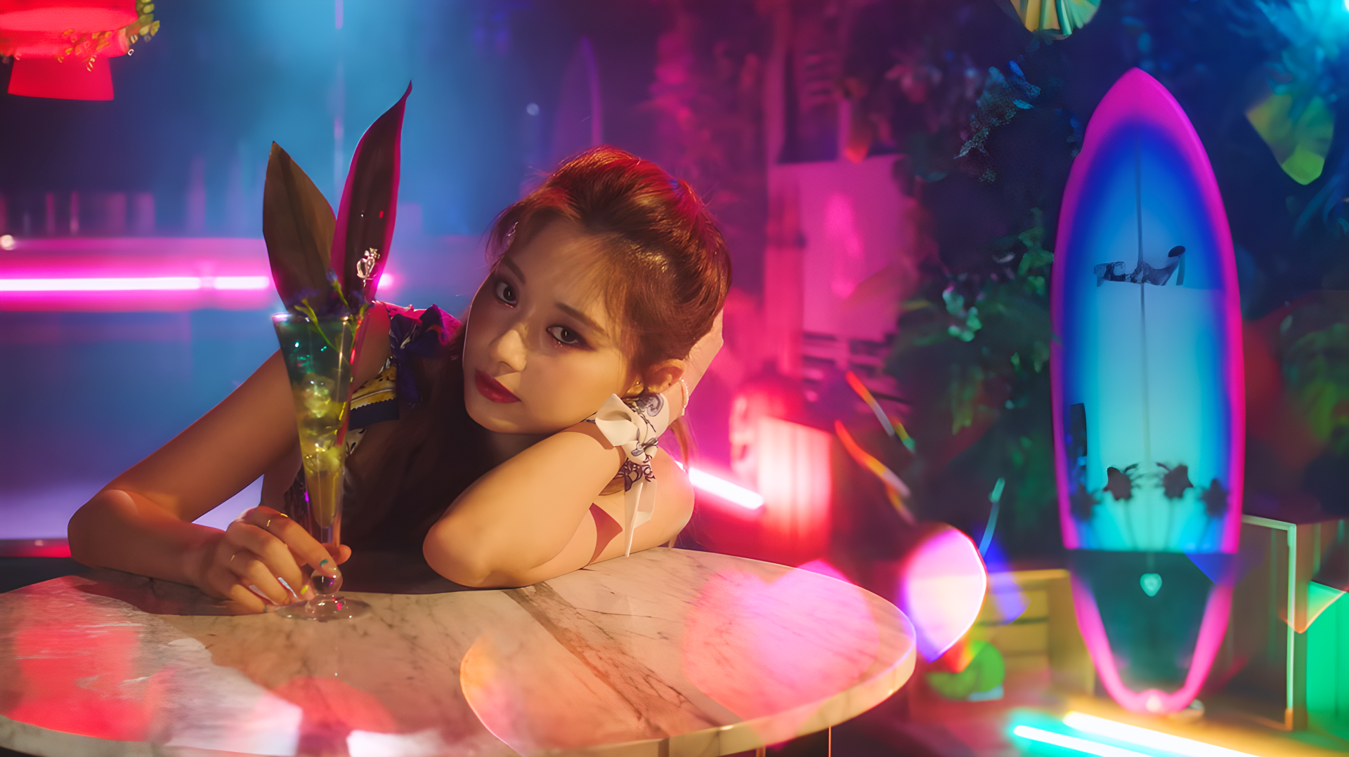 4K Ultra HD PC wallpaper/background: young woman reclining on a neon-lit table with a cocktail, surrounded by vaporwave hues and a glowing surfboard.