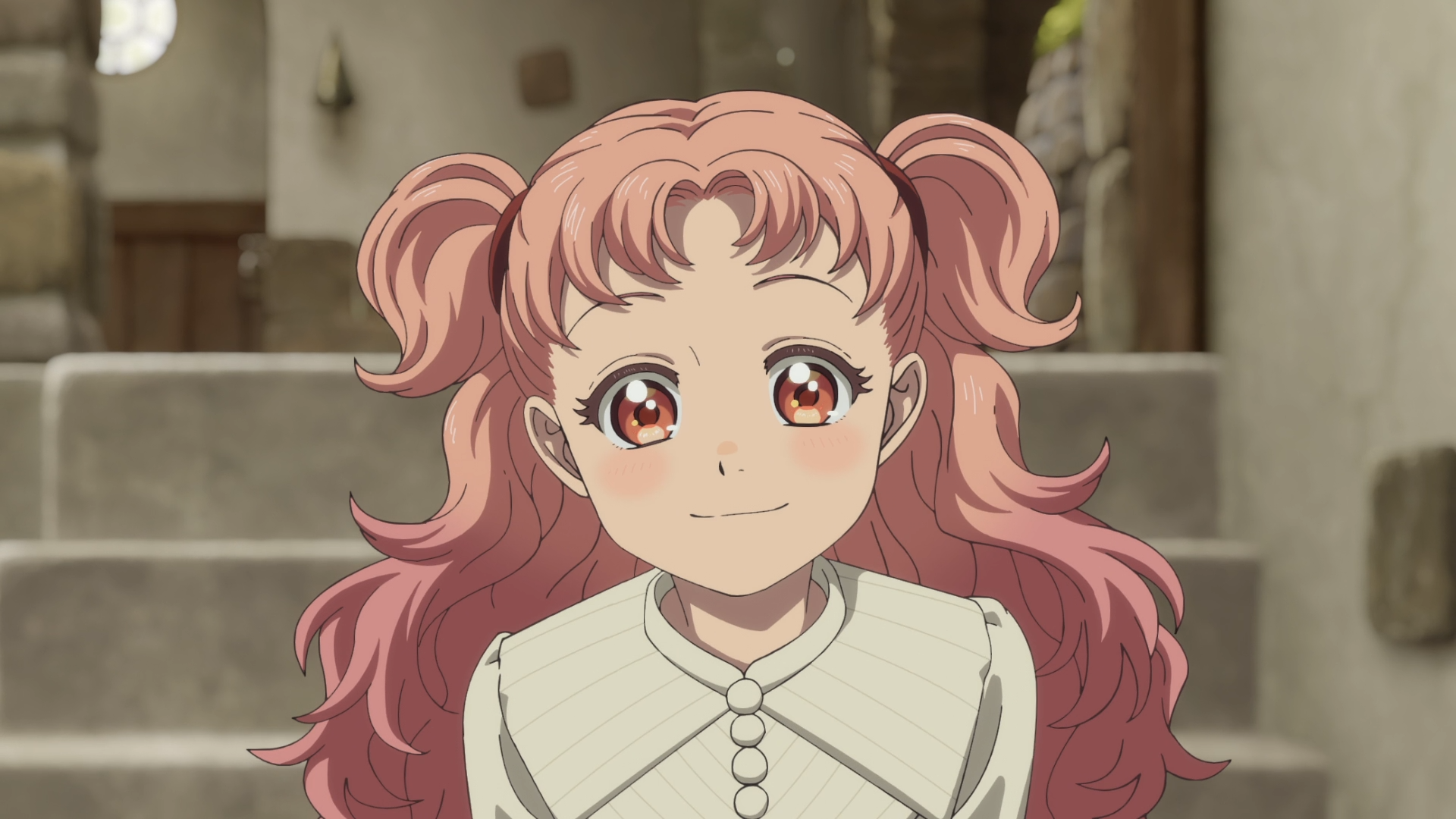 Tetia from the anime Witch Hat Atelier smiling with pink twin tails in a cozy interior staircase, HD PC desktop wallpaper.