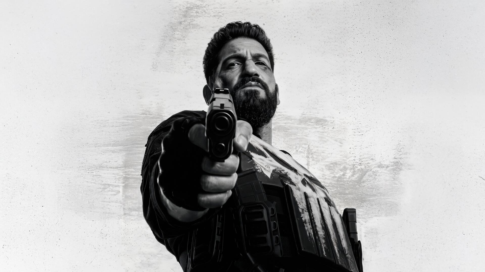 The Punisher: One Last Kill — grayscale 4K Ultra HD PC desktop wallpaper of the Punisher pointing a pistol at the viewer against a textured background.