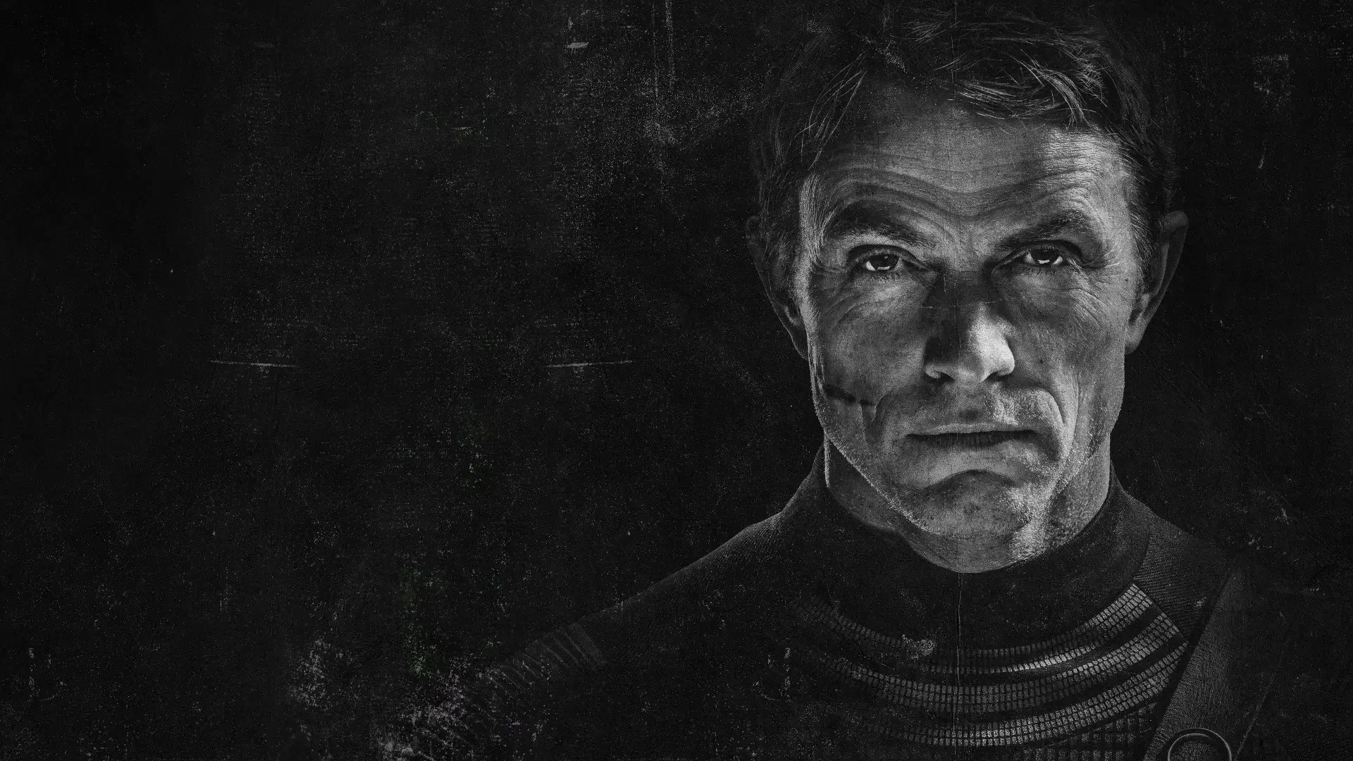 Grayscale close-up of Daredevil: Born Again, intense shadowed face with textured backdrop — 4K Ultra HD PC desktop wallpaper and background.