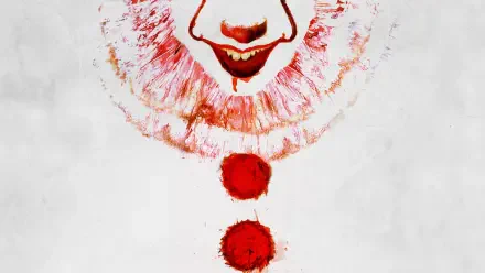 Pennywise from It (2017) HD PC desktop wallpaper: close-up of a sinister grinning clown mouth, ruffled collar and two blood-red pom-poms on a white background.