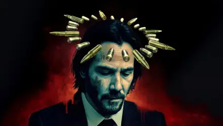 5K Ultra HD PC desktop wallpaper of John Wick in a dark suit, a halo of bullets above his head against a red-black moody backdrop.