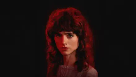 Stranger Things 5K Ultra HD PC desktop wallpaper: moody red-lit portrait of a young woman against a black background, cinematic horror vibe.