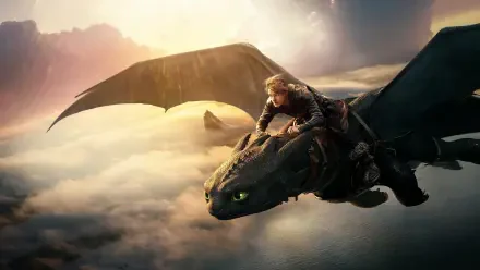 Hiccup riding Toothless over sunlit clouds at sunrise — How to Train Your Dragon (2025) 4K Ultra HD PC desktop wallpaper/background.