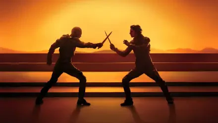 Dune: Part Two 2K Quad HD PC desktop wallpaper and background — silhouetted knife duel between two figures on tiered platforms against a blazing orange desert sunset.