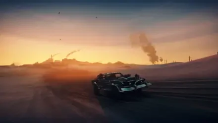 Mad Max video game HD PC desktop wallpaper: armored post‑apocalyptic car racing across desert dunes at sunset, smoke and wreckage rising on the distant horizon.
