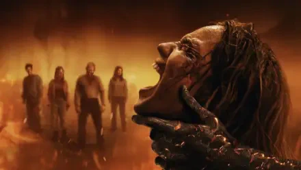 Evil Dead 2K Quad HD PC desktop wallpaper and background: fiery horror scene of a demon hand crushing a screaming woman's face as four shadowy figures loom in smoky orange mist.