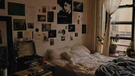 Cozy indie aesthetic bedroom: rumpled bed, collage of posters and photos above, potted plants by a curtained window — 4K Ultra HD PC Desktop Wallpaper and Background.