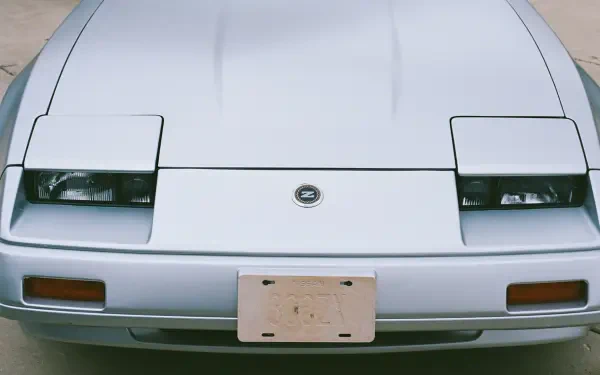 Silver vintage Nissan 300ZX JDM front with pop-up headlights — HD PC desktop wallpaper/background.