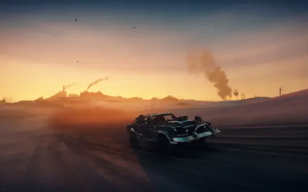 Mad Max video game HD PC desktop wallpaper: armored post‑apocalyptic car racing across desert dunes at sunset, smoke and wreckage rising on the distant horizon.