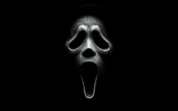 Scream 7 Ghostface-style screaming mask emerging from a black void — 8K Ultra HD PC desktop wallpaper/background, eerie high-contrast close-up