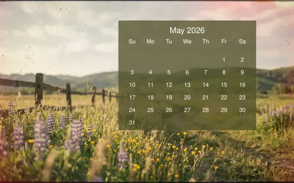 May 2026 calendar overlay on a 5K Ultra HD PC desktop wallpaper/background: sunlit wildflower meadow with rustic fence and distant rolling hills.