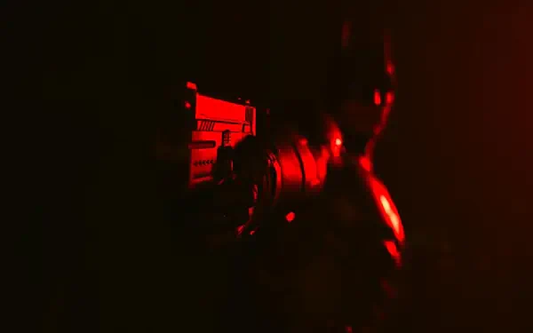 4K Ultra HD PC wallpaper: Suicide Squad: Kill the Justice League game art — dark, red-lit close-up silhouette of Batman holding a weapon against a shadowed, moody background.