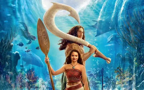 Moana (Live Action) 4K Ultra HD PC wallpaper — live-action Moana stands with a paddle before a swirling ocean vortex, manta rays overhead and vibrant coral reef below.
