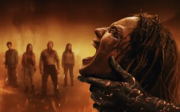 Evil Dead 2K Quad HD PC desktop wallpaper and background: fiery horror scene of a demon hand crushing a screaming woman's face as four shadowy figures loom in smoky orange mist.