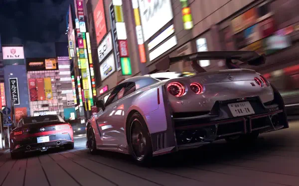 Forza Horizon 6 video game 4K Ultra HD PC desktop wallpaper showing two sports cars racing through neon-lit city streets at night.
