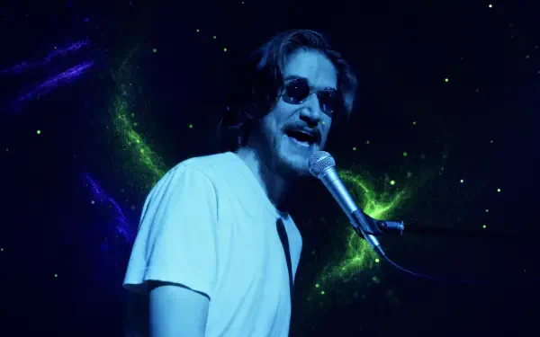 Performer singing into a microphone with neon galaxy swirls behind them — 4K Ultra HD PC desktop wallpaper and background.