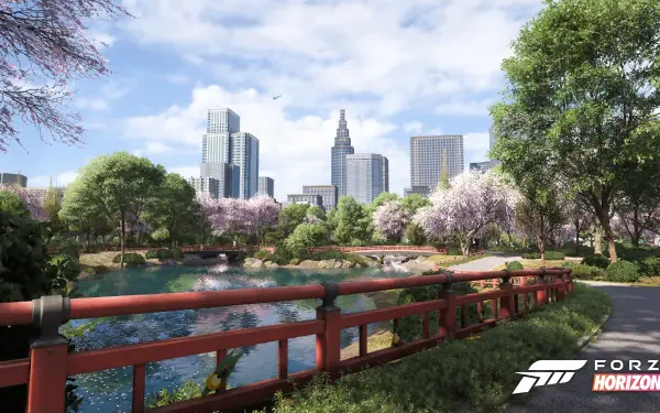 Forza Horizon 6 video game 4K Ultra HD PC desktop wallpaper: scenic park with red wooden bridge over a pond, cherry blossoms and trees, modern city skyline under a blue sky.