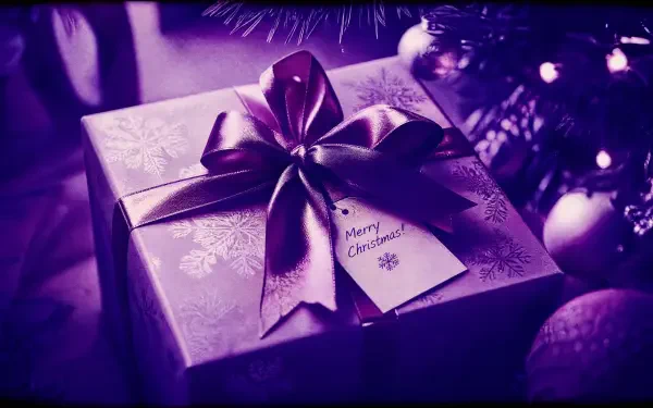 4K Ultra HD PC desktop wallpaper and background: close-up of a purple-wrapped Christmas gift with satin bow and tag beneath decorated tree ornaments.